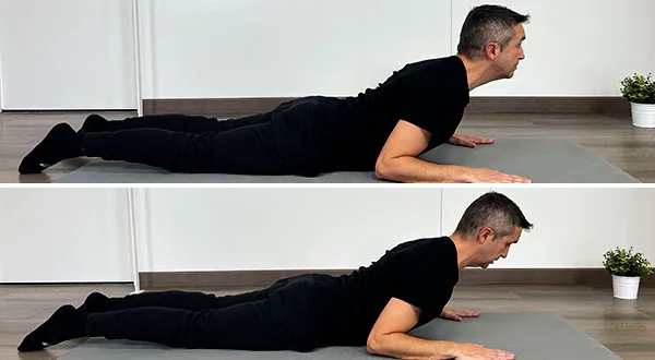 Vicente Juan Asencio en prono realizando una extensión dorsal con y sin hiperextensión cervical

